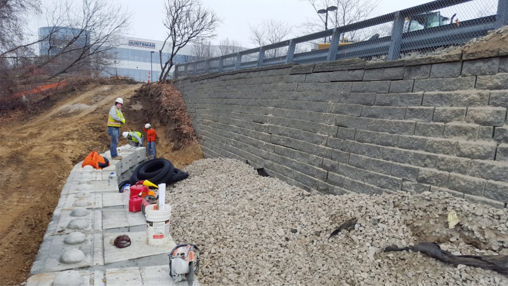 Dry cast retaining wall replacement with_Redi-Rock 1